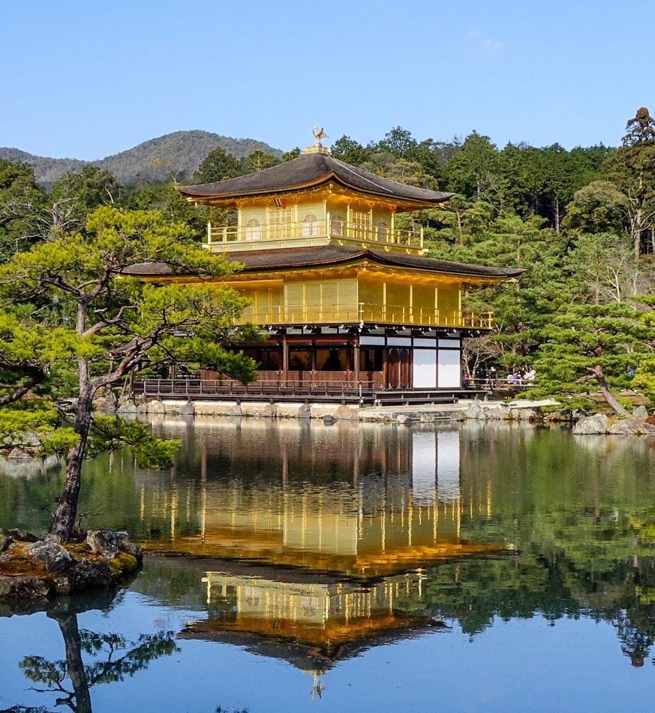 A picture of Kyoto's famous Kinkakuji.  This temple pagoda is covered in real gold.