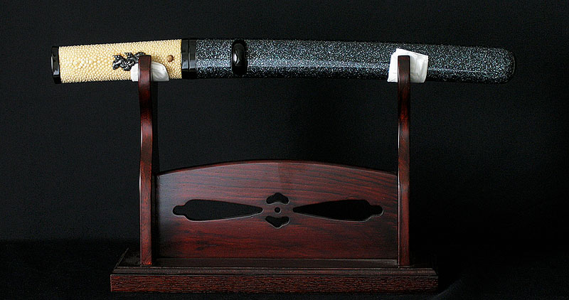 Image of Japanese sword Tanto on a sword rack