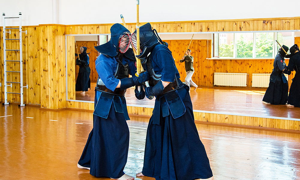 Middle-aged Kendo players doing Keiko training