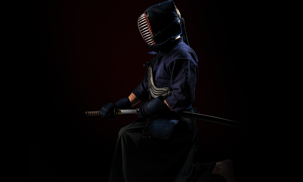 Image of Kendo player drawing Japanese sword