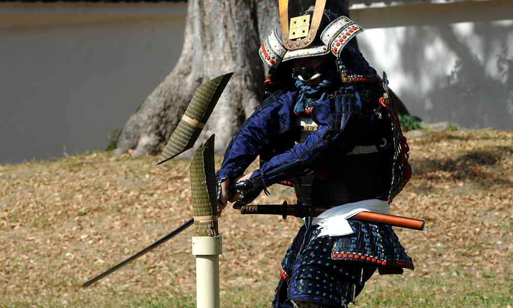 Samurai warrior cutting a roll of Tatami(Batto)