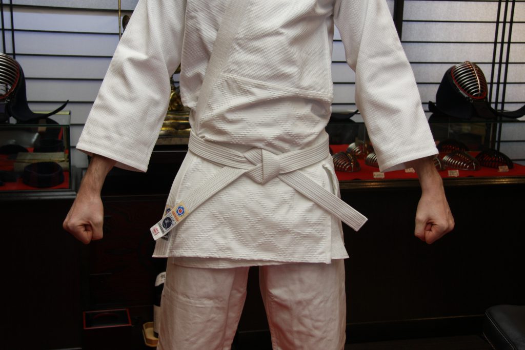 How to tie aikido belt best sale